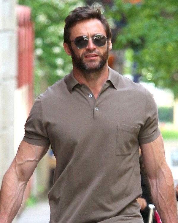 Hugh Jackman shows off huge biceps while out in NYC
